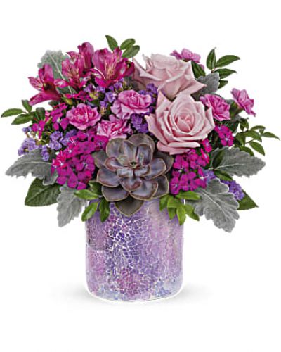 <div id="mark-3" class="m-pdp-tabs-marketing-description">As magical as sunset in the desert. Luscious pink roses and a sculptural succulent get the glamorous treatment in a shimmering mosaic glass vase.</div>
<p>&nbsp;</p>
<div id="desc-3">This chic bouquet features light pink roses, purple alstroemeria, miniature lavender carnations, dark pink sweet william, lavender sinuata statice, dusty miller, huckleberry and a large green echeveria succulent plant.</div>