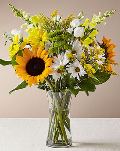 <p>Give a dose of sunshine in bloom. This stunning bouquet is teeming with rays of sunflowers, textured snapdragons and darling daisy poms to deliver the perfect pick–me–up for an occasion or as a treat to yourself.</p>