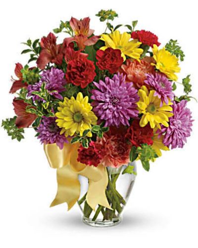 <div id="mark-1" class="m-pdp-tabs-marketing-description">She is yours, and you are hers. Remind her of that simple fact with this simply sweet mix of colorful flowers that are sure to warm her heart.</div>
<div id="desc-1">
<ul>
<li>Red alstroemeria, orange carnations, miniature red carnations, yellow daisies and lavender chrysanthemums are arranged with bupleurum and oregonia - with a pretty yellow ribbon tied around the vase for that extra-special touch.</li>
</ul>
</div>