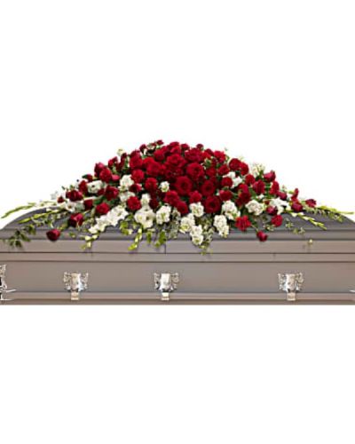 <div id="mark-1" class="m-pdp-tabs-marketing-description">A traditional tribute that communicates deep love and eternal commitment. This dramatic red and white casket spray is ideal for a full couch or closed casket, mixing dozens of deep red roses with the pure white beauty of gladioli and stock.</div>
<div id="desc-1">
<ul>
<li>Red roses and carnations are paired with snow white gladioli and stock, then accented with greens including variegated ivy and salal.</li>
</ul>
</div>