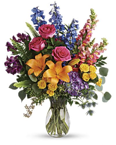 <div id="mark-3" class="m-pdp-tabs-marketing-description">A rainbow of beauty for any occasion. Purple hydrangea, pink roses and orange lilies positively pop in this bright bouquet, featuring all the colors of the rainbow.</div>
<p> </p>
<div id="desc-3">
<ul>
<li>This colorful bouquet includes purple hydrangea, pink roses, yellow spray roses, orange asiatic lilies, purple alstroemeria, blue delphinium, pink snapdragons, blue eryngium, huckleberry, oregonia, Israeli ruscus, sword fern, silver dollar eucalyptus, seeded eucalyptus, and lemon leaf.</li>
</ul>
</div>