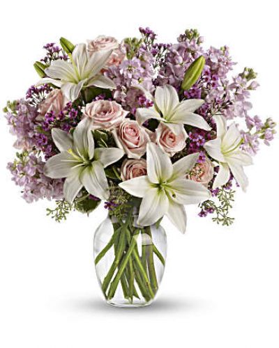 <div id="mark-3" class="m-pdp-tabs-marketing-description">Put your love into the season's most romantic flowers - light pink roses, fragrant white asiatic lilies and other favorites in a dazzling clear glass vase. Love will blossom in the most intoxicating way for a full week. You'll both enjoy it.</div>
<p>&nbsp;</p>
<div id="desc-3">
<ul>
<li>This spectacular bouquet includes light pink spray roses, white asiatic lilies, lavender stock and lavender waxflower accented with assorted greenery.</li>
</ul>
</div>